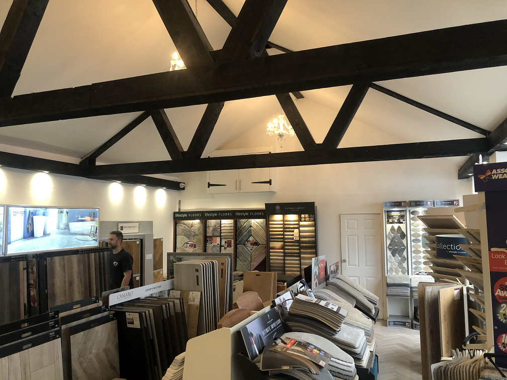 Flooring showroom with sample boards on display